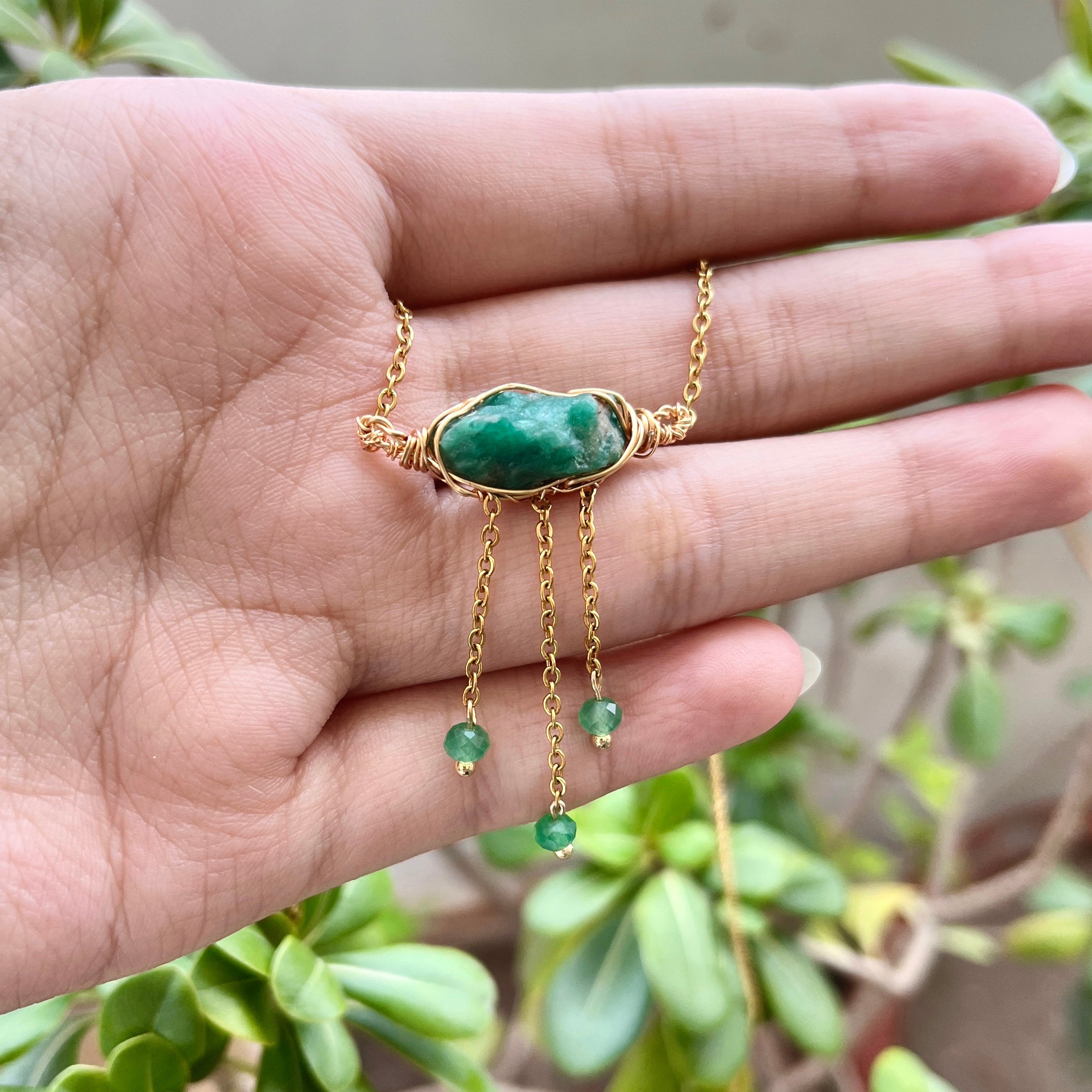 Emerald stone store pendant